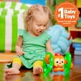 thumbnail image 4 of Bright Starts Roll & Glow Monkey Baby Toy with Lights and Melodies, Ages 6 Months +, 4 of 12