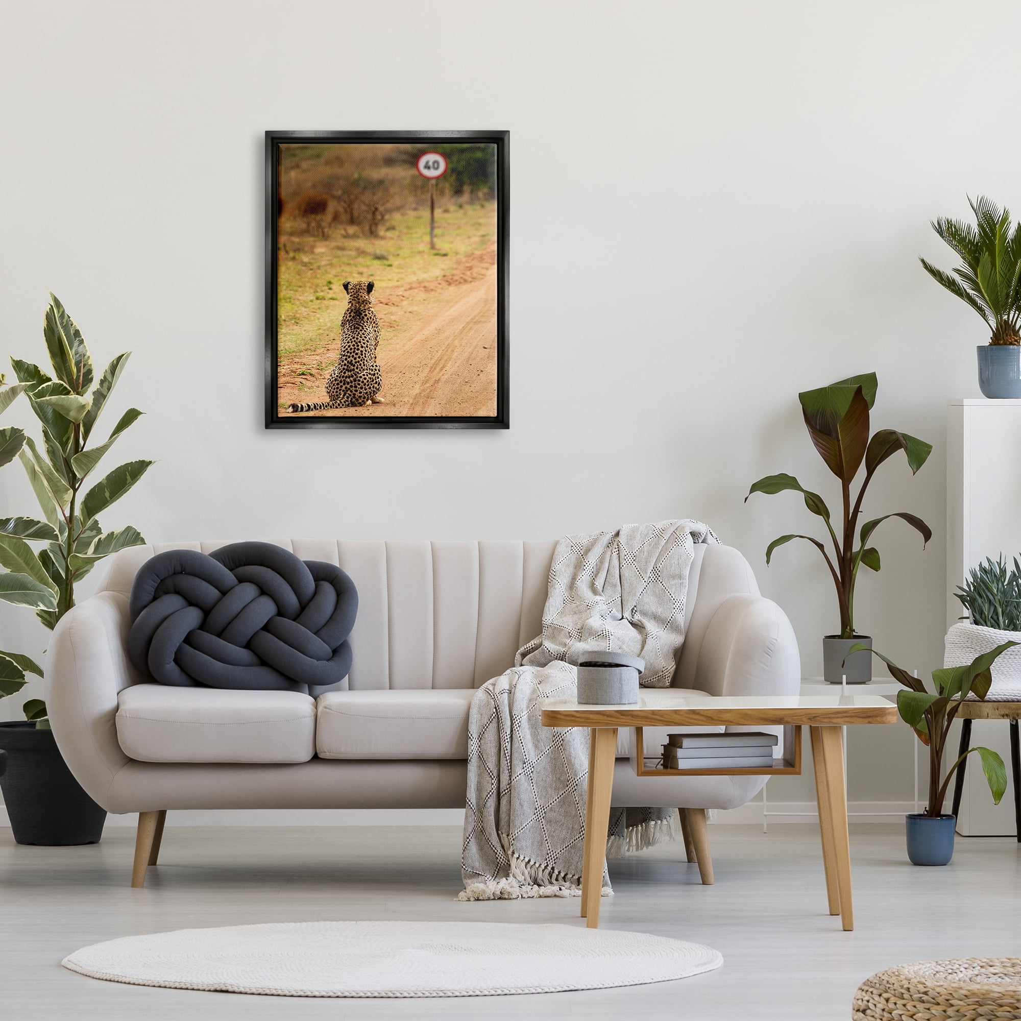 Stupell Industries Speedy Cheetah on Road Animals & Insects Photography Black Floater Framed Canvas Art Print Wall Art, 25 x 31