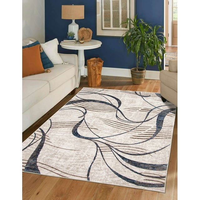 ECARPET Leah modern area rug featuring abstract blue and brown swirls on beige, placed in a living room with neutral sofas, wooden floor, white side table with lamp, and green plant.