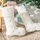 thumbnail image 1 of 2 uds calcetines navideños de copo de nieve plateado de felpa blanca 52CM Adepaton CJWUS-2071, 1 of 7