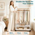 thumbnail image 3 of Yucurem Rolling Clothing Racks with 2 Hanging Rods, Clothes Rack with 2-Tier Bottom Shelf, Bear up to 250lb for Bedroom (56"x47"x16" White), 3 of 8