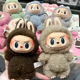 thumbnail image 4 of Labubu tiene un asiento y macarrón, mochila de muñeca con cara de vinilo, colgante decorado para caja ciega sorpresa, regalos misteriosos para niñas, caja ciega, 4 of 5
