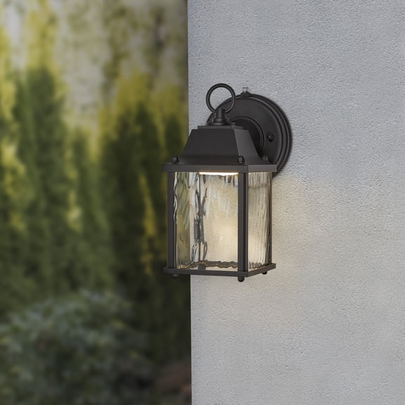 Maxxima LED Porch Lantern Outdoor Wall Light, Black with Clear Water Glass, Photocell Sensor, 650 Lumens, Dusk to Dawn Sensor, 3000K Warm White, Modern Exterior Patio Sconce Lantern