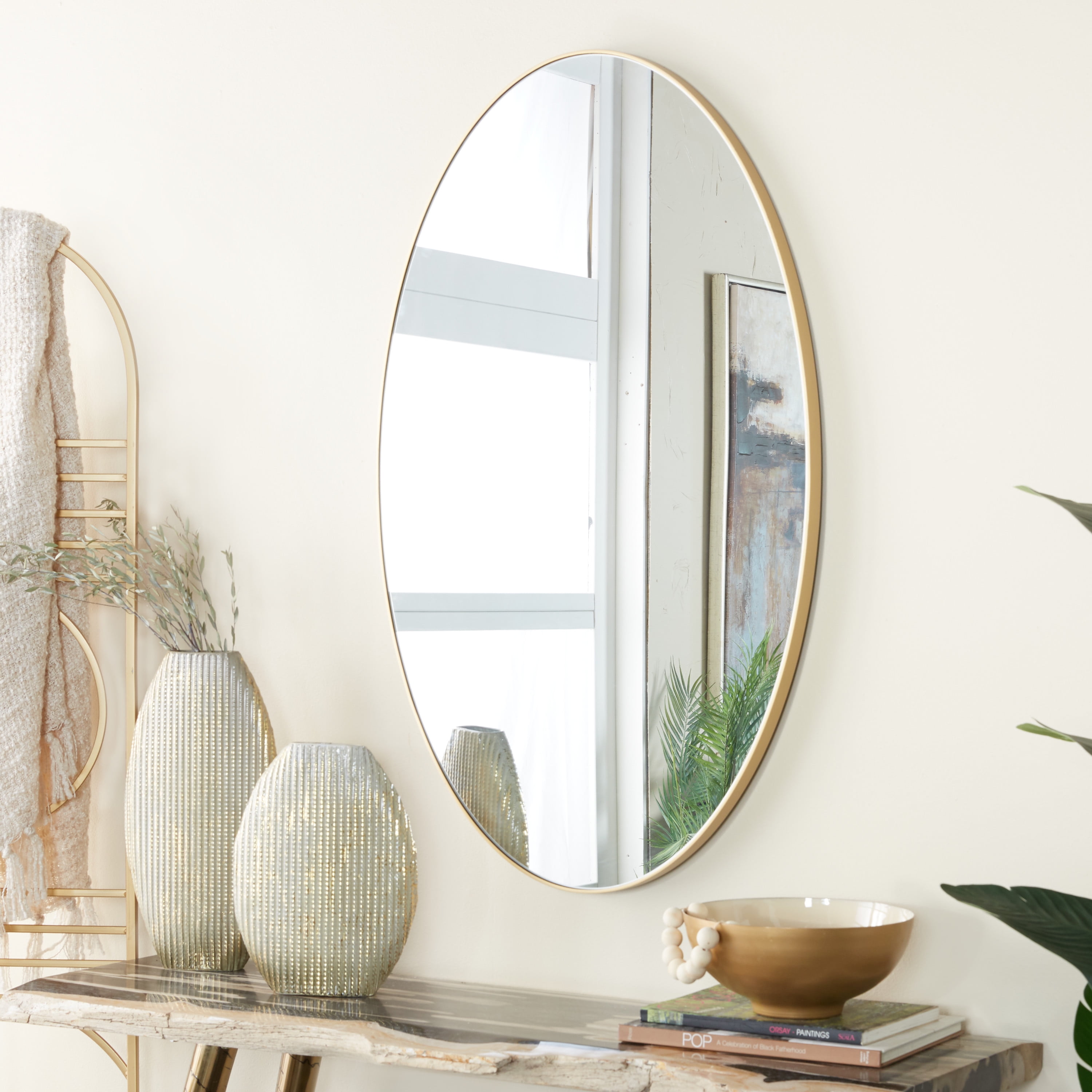 DecMode 24" x 40" Gold Oval Wall Mirror with Thin Minimalistic Frame