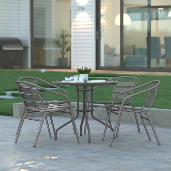 Emma Oliver 31.5'' Round Glass Top Metal Table with 4 Silver Aluminum Slat Stack Chairs