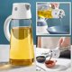 thumbnail image 1 of Drip Free Olive Oil Dispenser Bottle for Kitchen Cooking, 23 OZ Automatic Flip Open Borosilicate Glass Condiment Container with Measurement BPA-Free L, 1 of 5