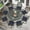 Dark Bronze/Navy Blue, variant on MEETWARM 9-Piece Outdoor Patio Dining Set, All-Weather Cast Aluminum Patio Conversation Set- 8 Cushioned Swivel Rocker, 61" Round Patio Dining Table w/Detachable Lazy Susan/Umbrella Hole, Chili Red