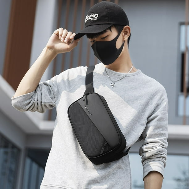 Cangurera cruzada Mark Ryden. Estilo casual y espacio para iPad de 7.9 y accesorios. Mark Ryden MR8112 00 Bodega Aurrera en linea