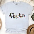 thumbnail image 1 of Nurse Graphic T-Shirt with String Lights Design, Unisex Casual Tee, Ash, Size M, 1 of 6
