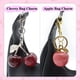 thumbnail image 3 of Juego de 12 Llaveros con para Bolso, con Dijes de , para Mujer, Dorados, Rojos y Negros., 3 of 5