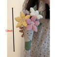 thumbnail image 3 of Muñeca de peluche flor suave con rostro sonriente Courtco, 3 of 6