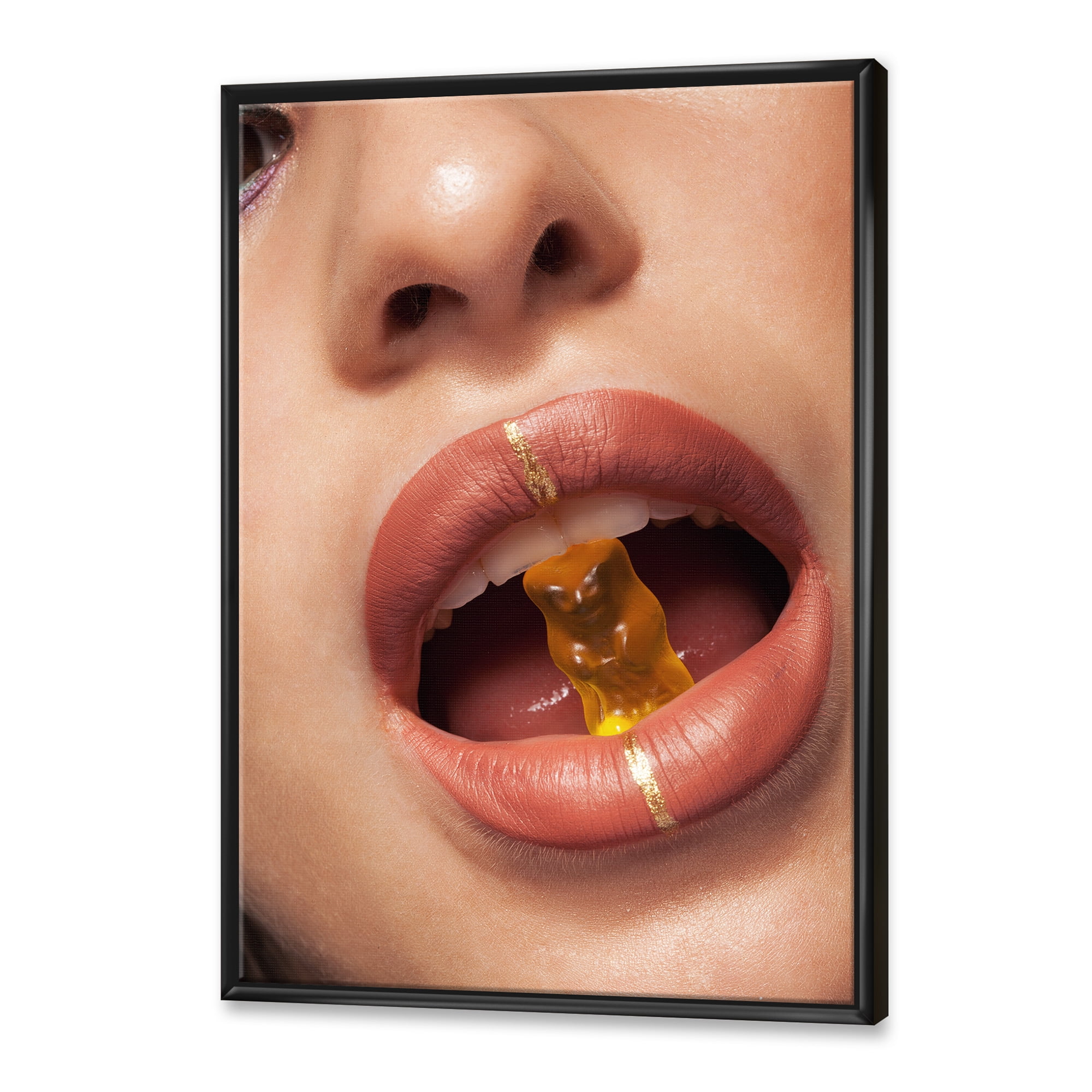 Designart 'Close Up VIew of Female Lips Biting Gummy Bear' Modern Framed Canvas Wall Art Print