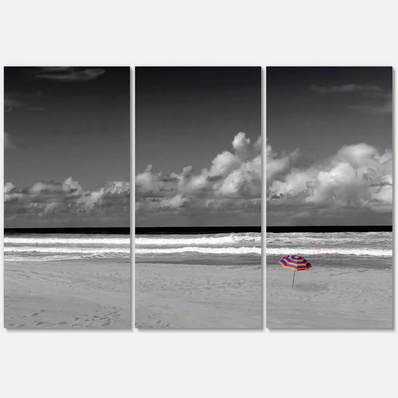 Designart ' Black and White Coastline Under Cloudy Sky ' Lake House Canvas Wall Art Print