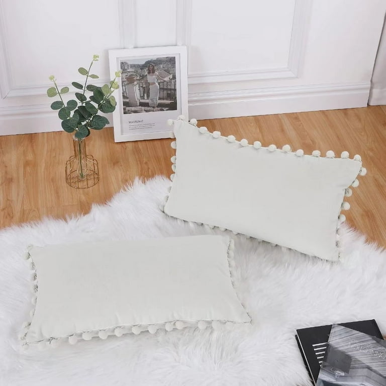 White pillow with pom cheap poms