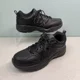 thumbnail image 1 of New Balance 409 Men's 10.5 4E Extra Wide Black Leather Low Top Training Sneakers, 1 of 5
