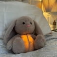 thumbnail image 2 of Lindo conejo de peluche que respira, 28 cm, diseño biónico, música relajante, algodón PP agradable para la piel, regalo perfecto para niños., 2 of 5