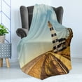 thumbnail image 4 of Lighthouse Soft Flannel Fleece Blanket, Sandy Coastal Beach with Lighthouse Sea Waves Wind Wooden Fence Pine Tree Clouds, Cozy Plush for Indoor and Outdoor Use, 50" x 70", Multicolor, by Ambesonne, 4 of 5