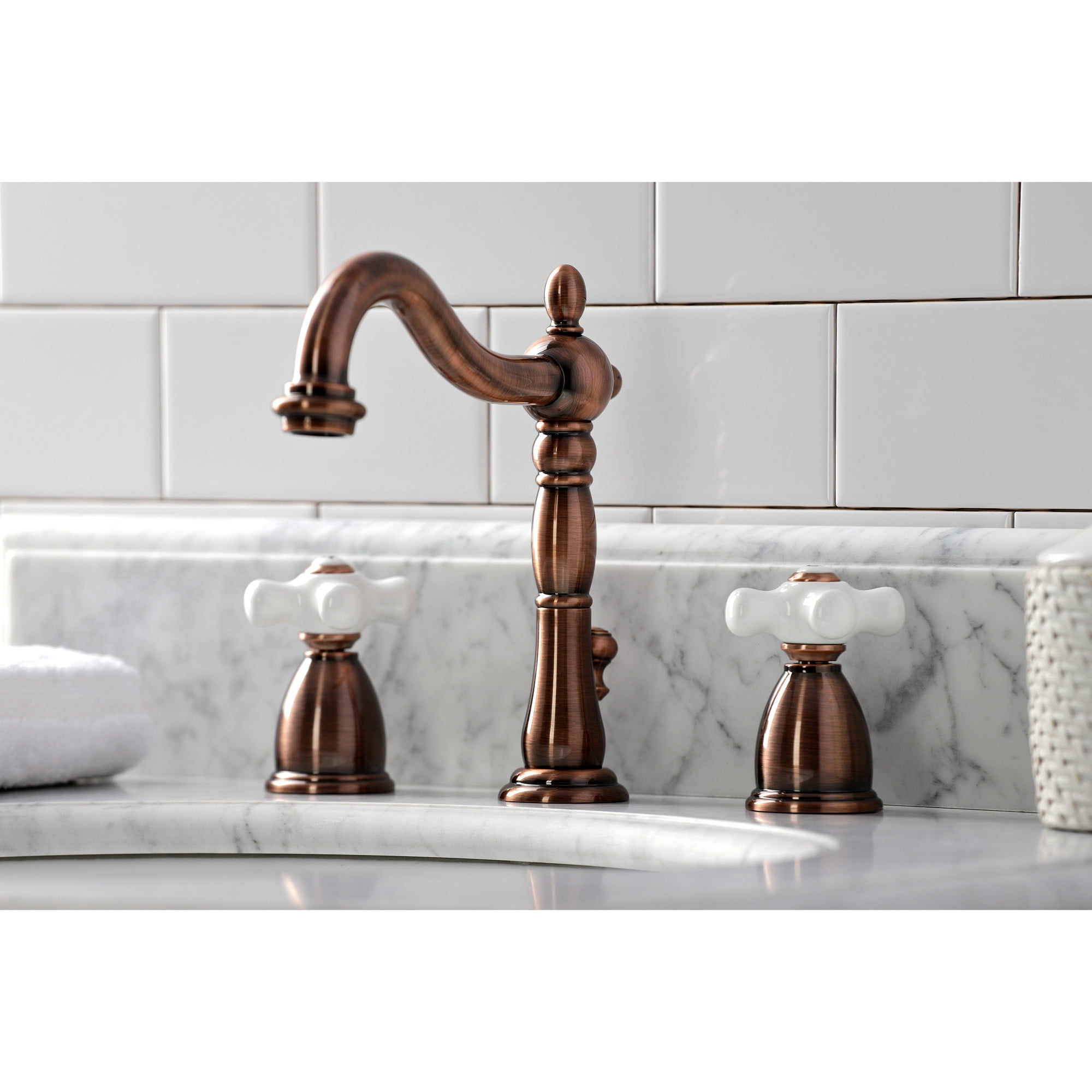 Kingston Brass KB197PXAC Heritage Widespread Bathroom Faucet with Brass Pop-Up, Antique Copper