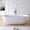 Matte White, variant on MEDUNJESS 69" Solid Surface Freestanding Bathtub, Oval Luxury Contemporary Stone Resin Bathtub Stand Alone Tub with Pop-up Drain and Overflow, Matte White