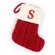 thumbnail image 1 of Medias navideñas personalizadas con letras del alfabeto: calcetines de dulces festivos con lazo para colgar, ideales para decorar el árbol y regalar en las fiestas., 1 of 2