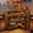 Brown, variant on Fnova L-Shaped Home Bar Unit with Metal Footrest, 4-Tier Corner Liquor Display Unit, Versatile Reception Desk with Storage, Brown