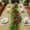 As shown, variant on Ireezec Artificial Christmas Berry Vine Garland with Pine Needles, Faux Greenery Decor for Staircase Railing Mantel Table Centerpiece Holiday Party Wedding Home Festive Decoration