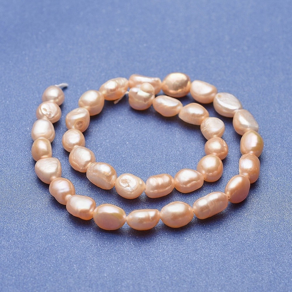 1strand Cultured Freshwater Pearl Beads Strands Two Sides Polished Bisque 9~15x8~9mm Hole: 0.5mm about 33~35pcs/strand 12.99~13.39 inch(33~34cm)
