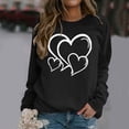thumbnail image 1 of Fartey Chandail en Molleton de la Saint-Valentin pour Femmes Imprimé Cœur Tendance Col Rond Chandail Décontracté Manches Longues Mode Printemps Automne Épaules Tombantes Chandails en Molleton 2025 Noir, 1 of 4