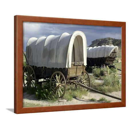 - Restored Covered Wagons at Scotts Bluff National Monument on the Oregon Trail in Nebraska Framed Print Wall Art