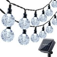 thumbnail image 1 of FloreceBien Guirnaldas de luces solares para exteriores, 35.6 pies, 60 luces LED tipo globo, impermeables, 8 modos, luces solares para jardín, patio, cenador, patio, exteriores (blanco cálido), 1 of 7