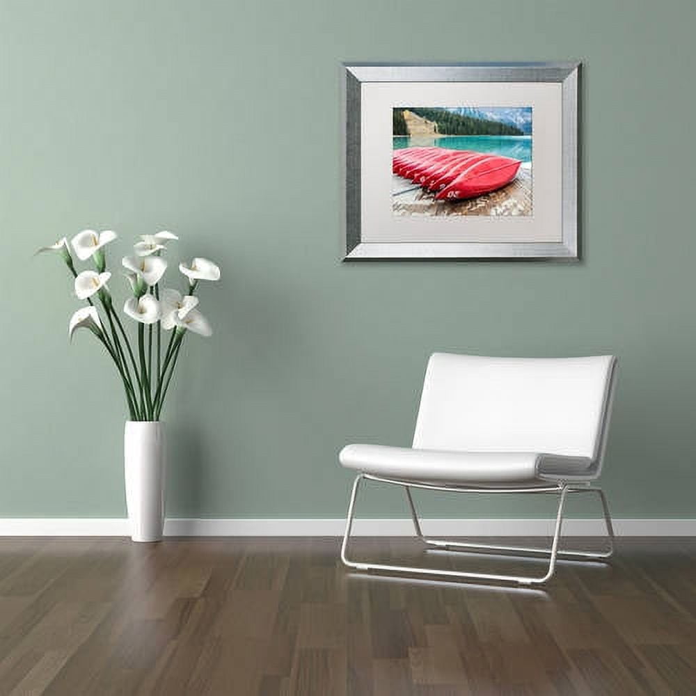 Trademark Fine Art 'Red Canoes of Emerald Lake' Canvas Art by Pierre Leclerc, White Matte, Silver Frame