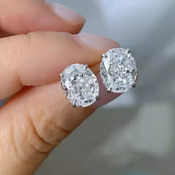 2.00 Ct Oval Cut VVS1 Moissanite Solitaire Stud Earrings 14K White Gold Plated