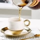 thumbnail image 5 of Bewildely Taza de café con trazado de oro de cerámica de estilo europeo, juego de té, platillo, cuchara, tazas, utensilios de café para fiesta, cocina Juegos de servir café y té Blanco 200ML Bewildely HA080471-03, 5 of 6