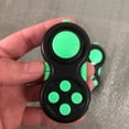 thumbnail image 1 of El juguete de almohadilla de juego de control clásico de goma con 8 funciones inquietas y cordón, perfecto para aliviar, 1 of 3