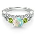 thumbnail image 2 of Gem Stone King 925 Sterling Silver White Simulated Opal Green Peridot and White Moissanite Engagement Ring for Women (0.81 Cttw, Gemstone October Birthstone, Round Cabochon 6MM and 3MM, Size 5), 2 of 4