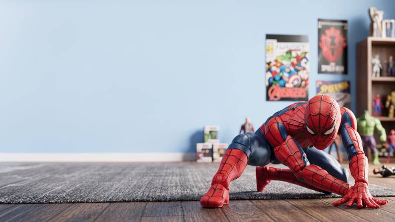 Marvel Legends Series Spider-Man figure in a bedroom with posters and other collectibles displayed.