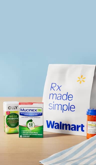 Olly probiotic, Mucinex, a prescription bag, and medication bottle.