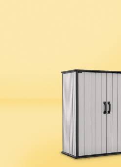 An upright outdoor cabinet featuring white vertical slats and black trim.