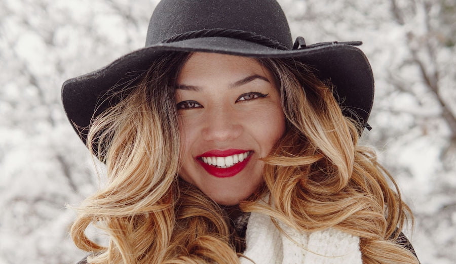woman smiling in snow