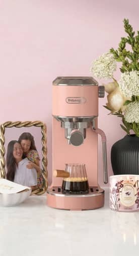 From five dollars ninety-seven. Trinket dish, picture frame, De’Longhi espresso machine, flowers in vase and decorative candle.