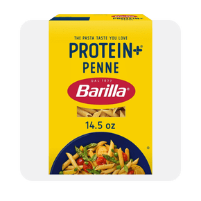 Image shows a yellow box of Barilla Protein+ Penne Pasta, a plant-based pasta, weighing fourteen point five ounces, with pasta imagery.