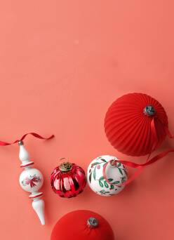 Red and white baubles and final-shaped tree ornament shown.