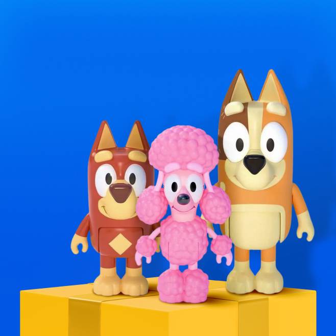 A trio of Bluey figurines.