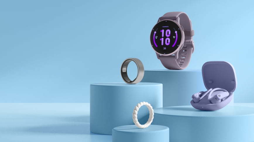 Two smart rings, a smart watch with a purple display and purple earbuds in a case.