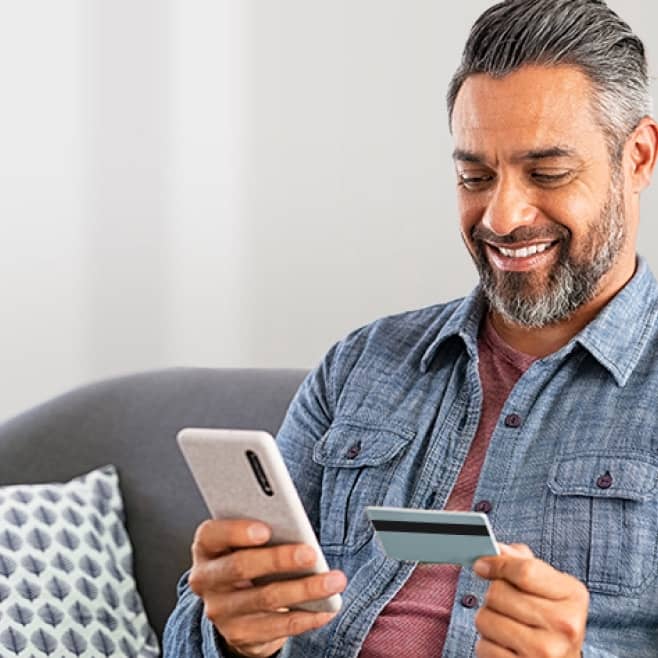 A person holding a phone and a card. Easy checkout, in-store & online. Add a SNAP EBT card to your wallet. Add to wallet.