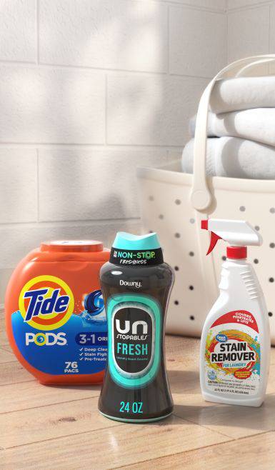 Tide detergent pods, Great Value stain remover, and Downy Unstoppables fresh scent booters.