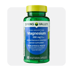 Spring Valley magnesium 200 milligrams dietary supplement, 60 vegetarian capsules, in a green bottle with a yellow cap.