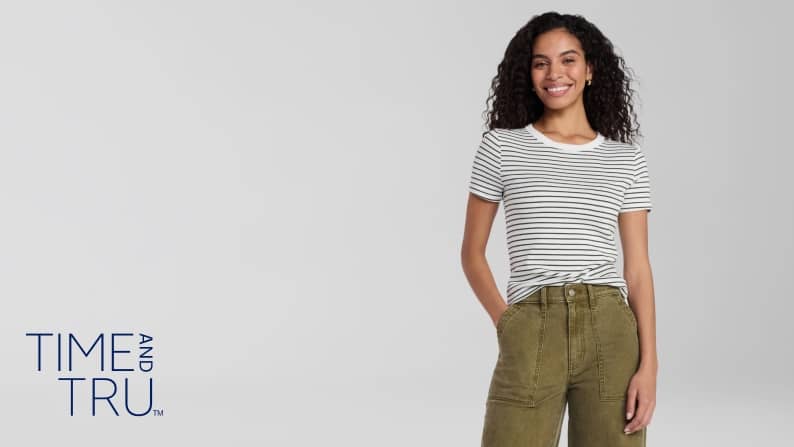 Time and Tru logo. A woman is wearing a striped t-shirt and green pants.