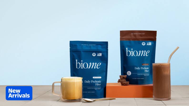 New arrivals badge. Bio.me’s daily prebiotic fibers powder in unflavored
 and chocolate packaging. Plus, ingredients, mixed drinks & 
tablespoon.