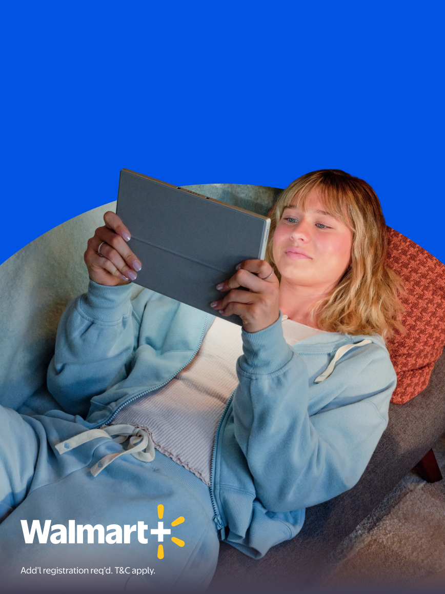 Walmart Plus. Add one registration required. T and C apply. An adult relaxes on a chair using a tablet.